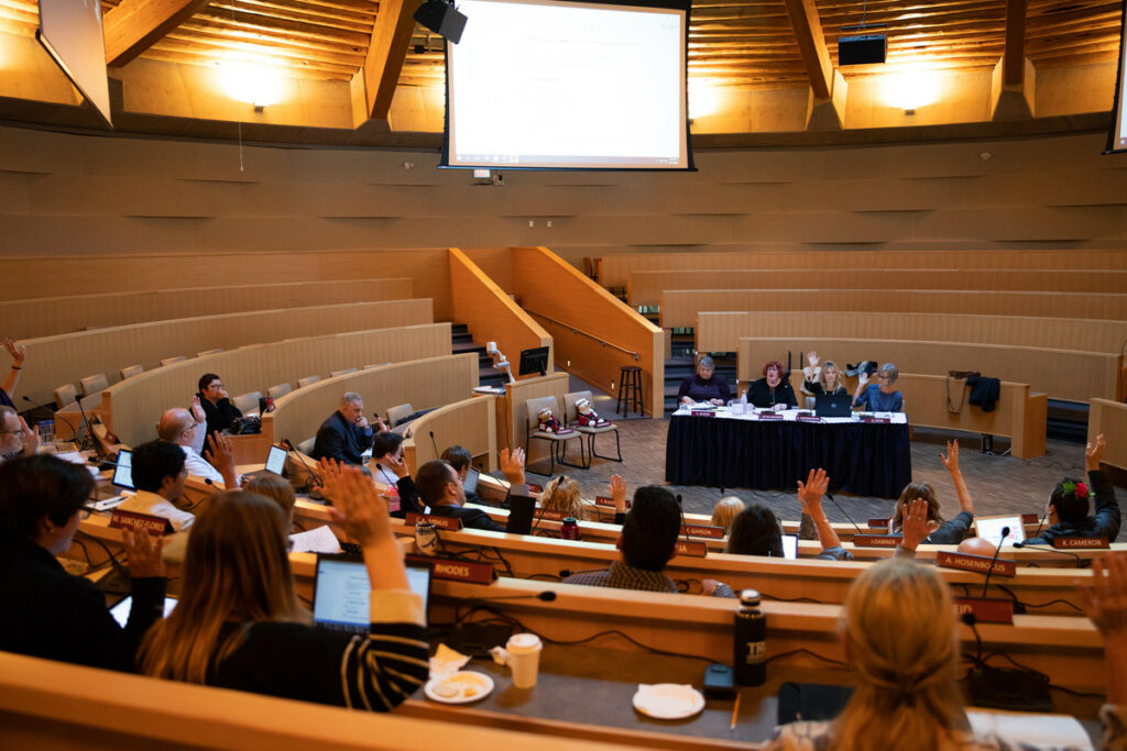 Photo of the university Senate meeting in HOL 190